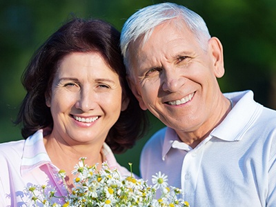 Smiling senior couple outdoors