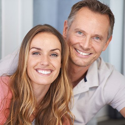 Tysons man and woman smiling