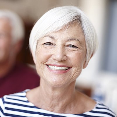 Tysons teeth-in-a-day woman smiling