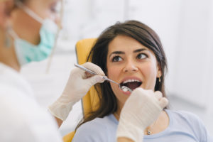 woman receiving dental treatment